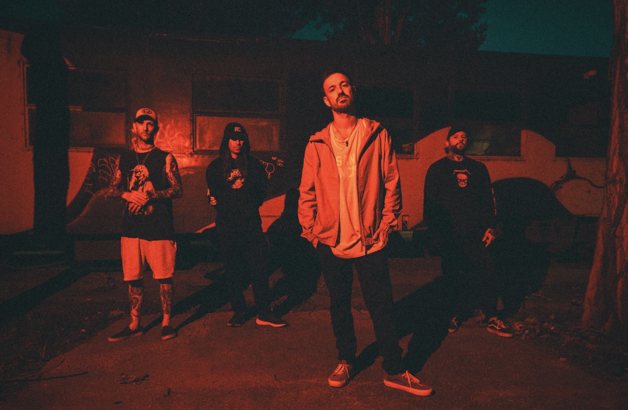 French metalcore band LAFAYETTE standing together in dramatic red light
