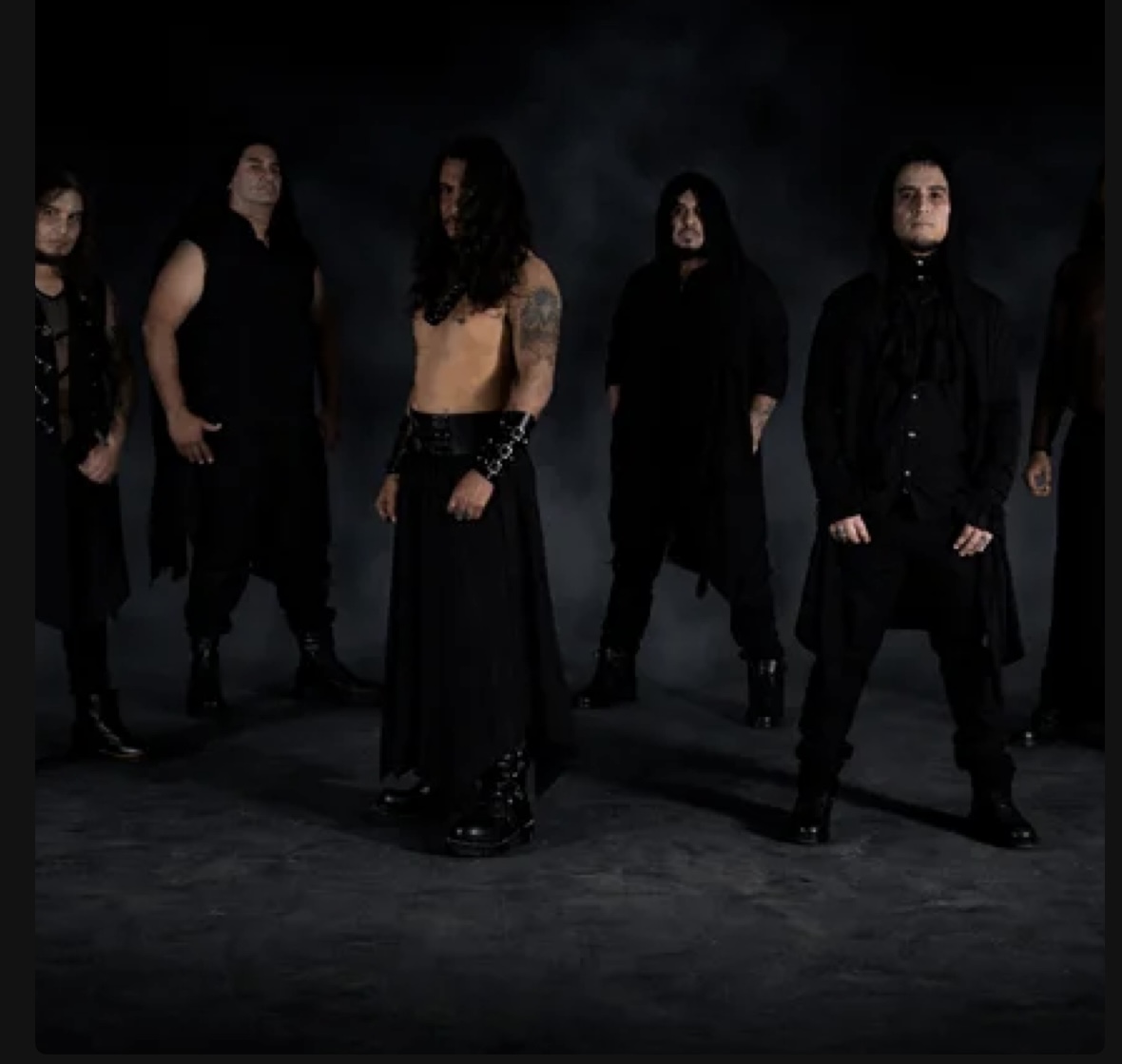 Angel of Decadence band members photographed in dark gothic attire