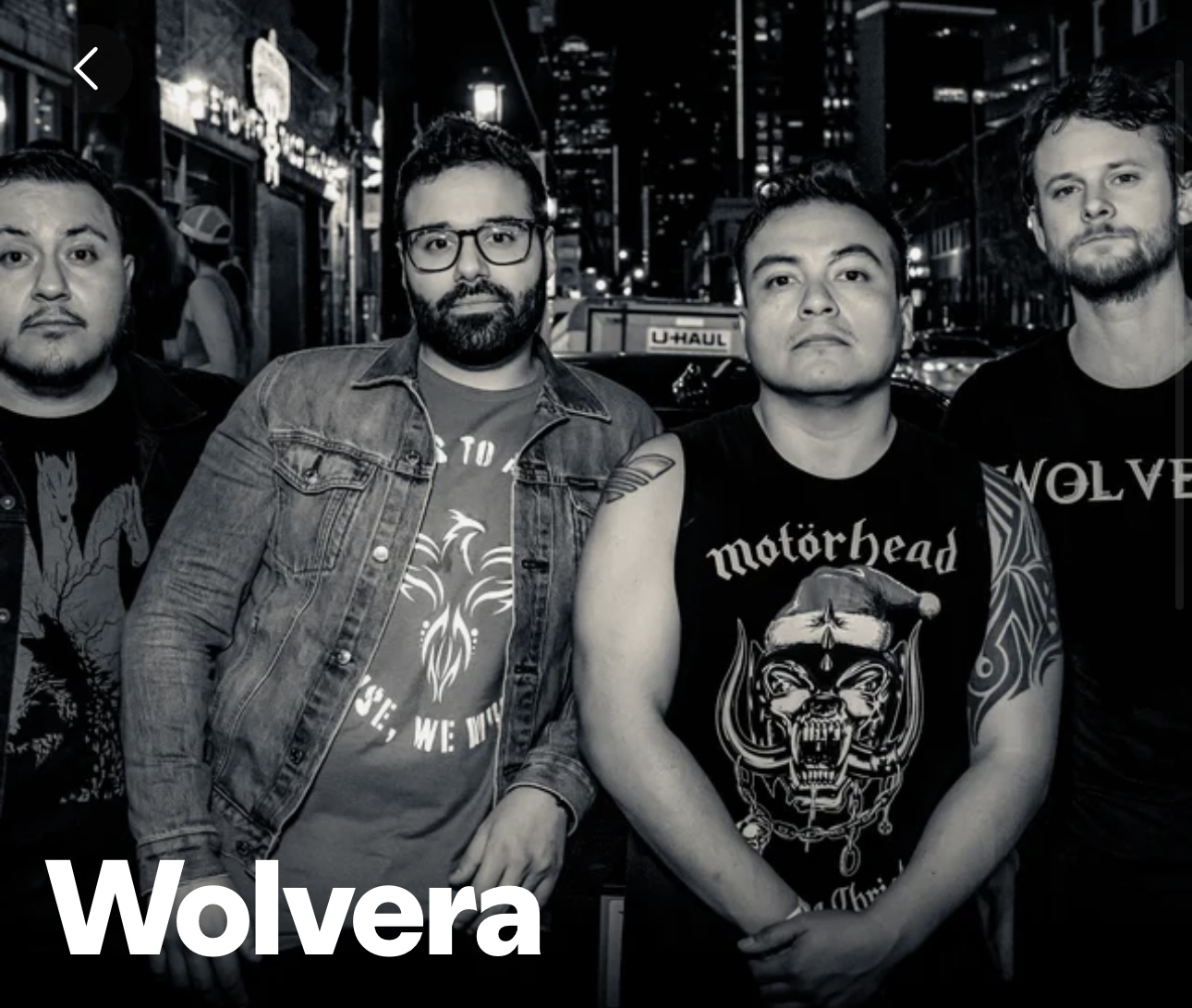 Wolvera band members photographed in monochrome on a city street