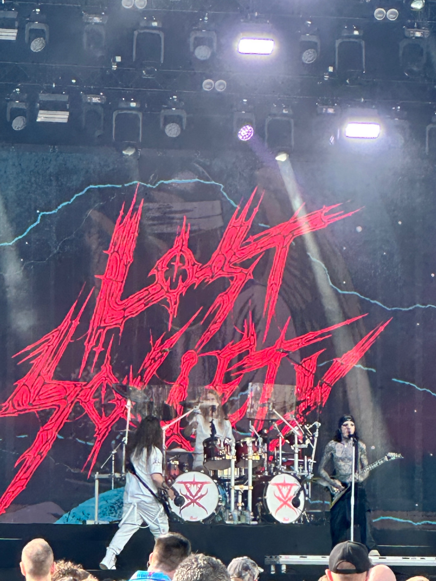 Lost Society close-up with red band logo backdrop, Ruisrock 2026